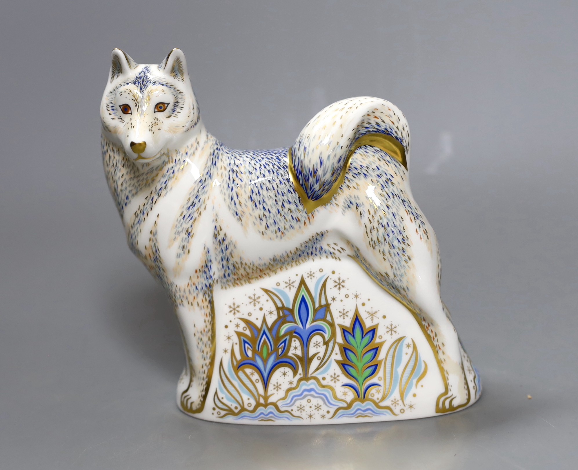 A Royal Crown Derby paperweight - Husky, gold stopper, boxed, no certificate